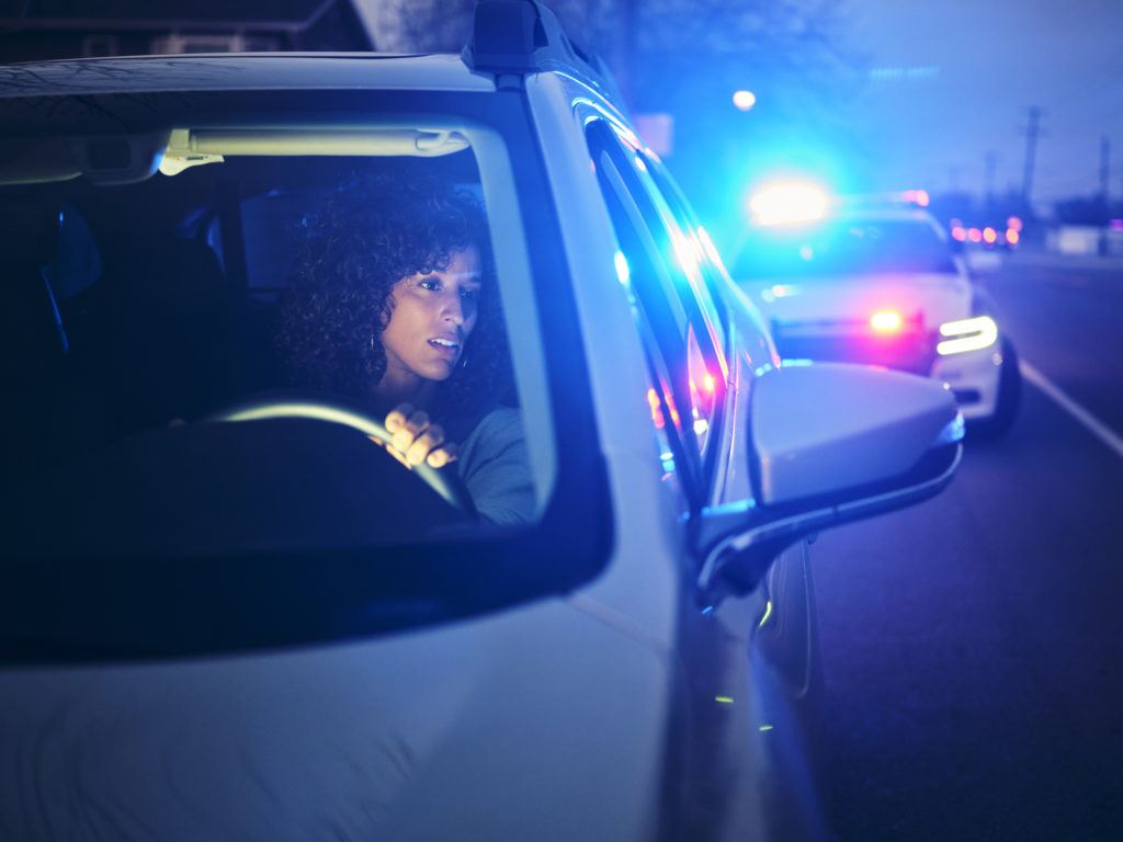 Photograph of a woman being pulled over for DUI/DWI