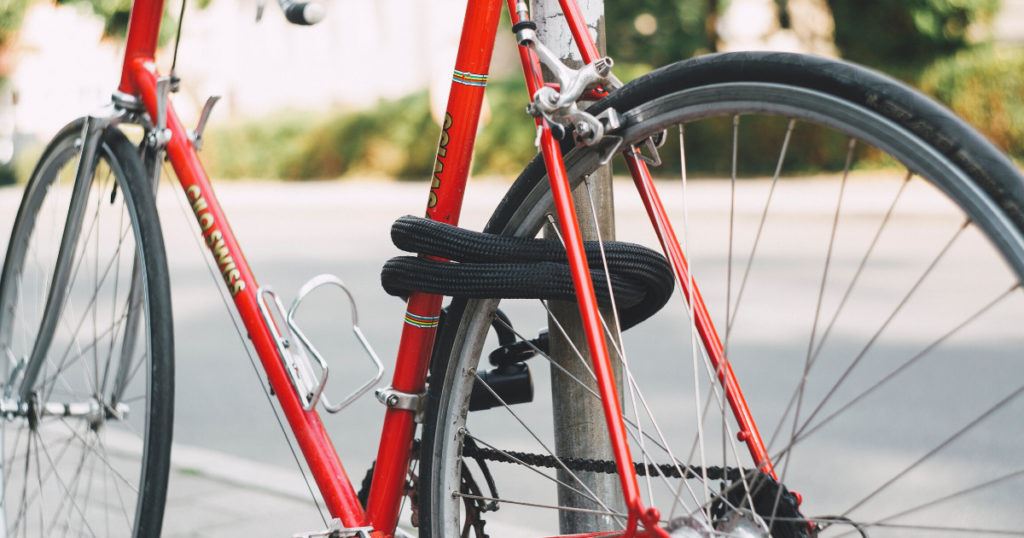 red bike with locked back wheel