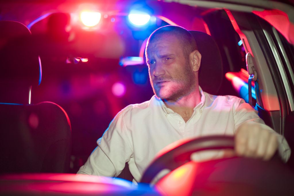 Photograph of a man involved in a traffic stop.