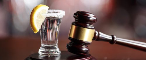 A tequila shot and a gavel 