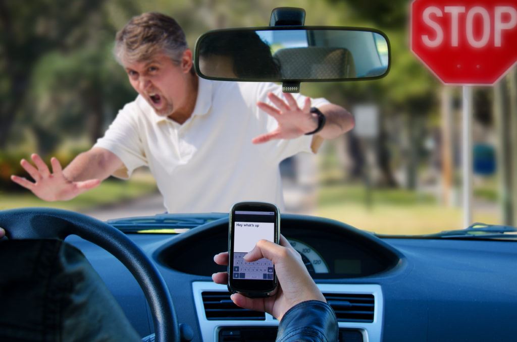 texting driver hitting man in crosswalk